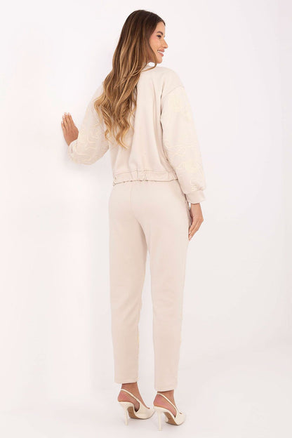 Italy Moda Women's stylish tracksuit set featuring a luxurious zip-up hoodie with unique embroidery, perfect for upscale casual wear.