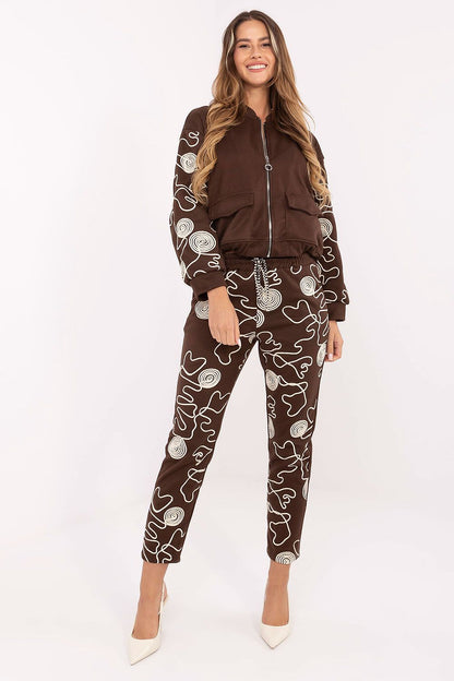 Italy Moda tapered pants from the women's tracksuit set, showcasing a high waist design and exquisite embroidery details for a sophisticated look.