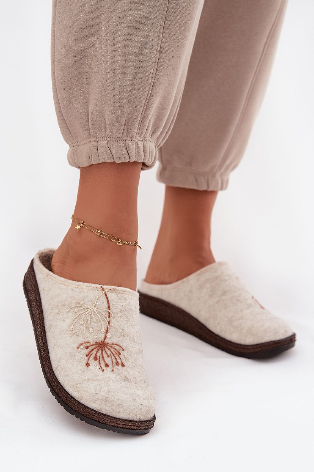 Luxury women's felt slippers by Step in Style featuring a soft, contoured fit ensuring comfort for daily wear.
