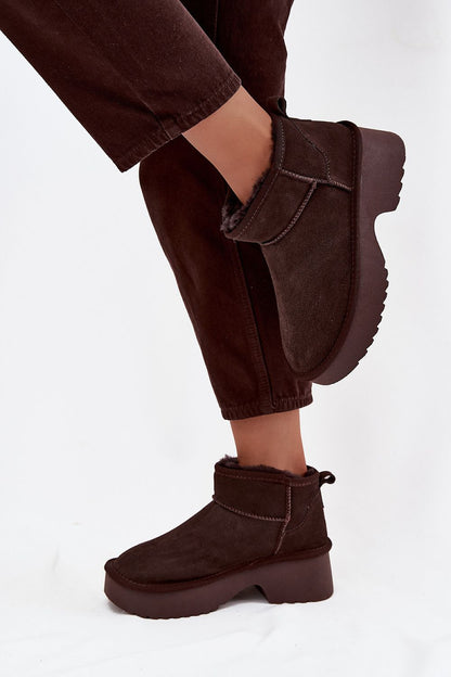 Elegant luxury women's suede snow boots by Step in Style, highlighting the chic platform design and premium fur lining, ideal for cold weather.