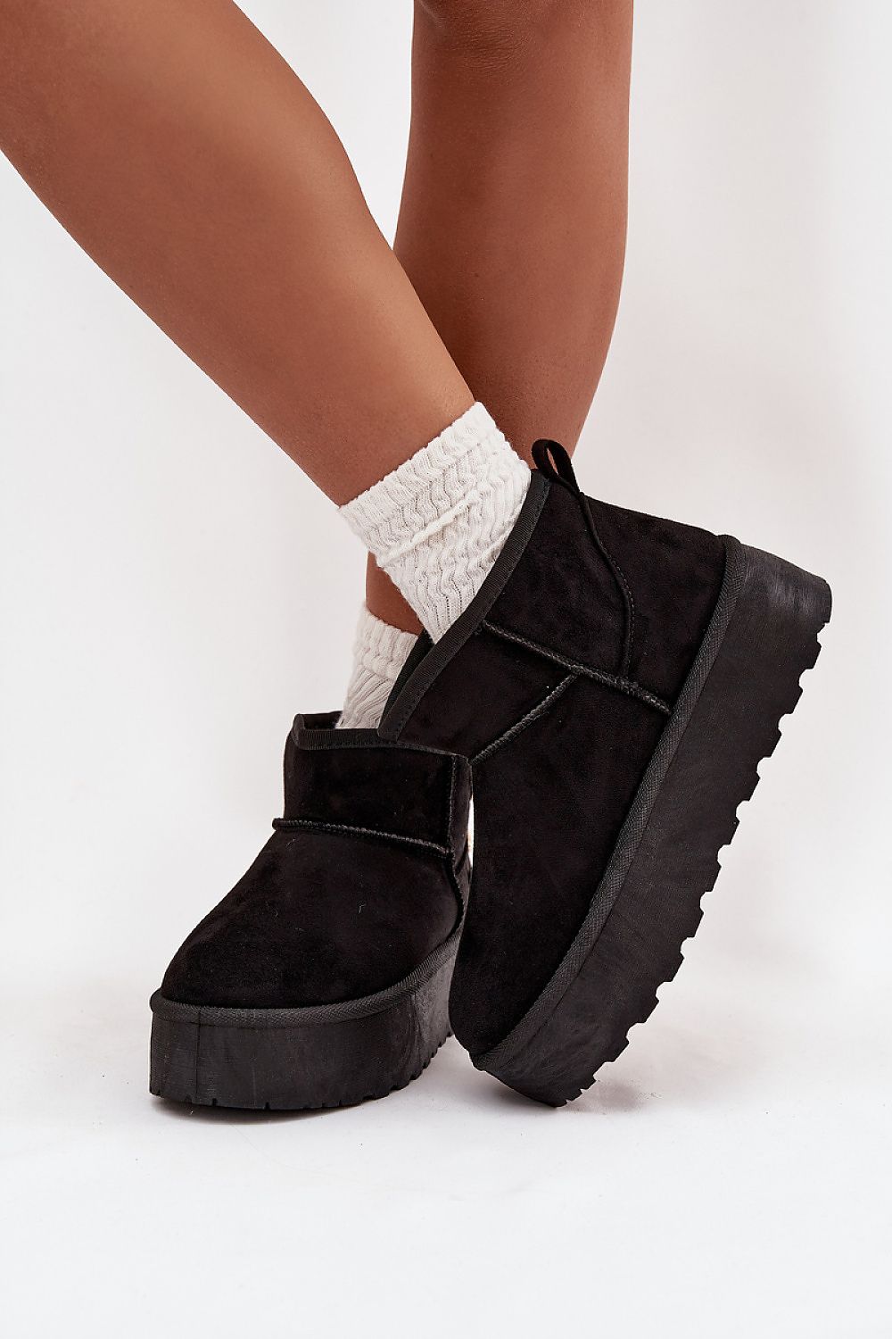 Chic luxury faux suede snow boots for women featuring decorative buckles, crafted by Step in Style, ideal for fashionable winter outings.
