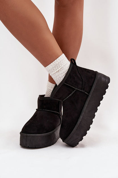 Chic luxury faux suede snow boots for women featuring decorative buckles, crafted by Step in Style, ideal for fashionable winter outings.