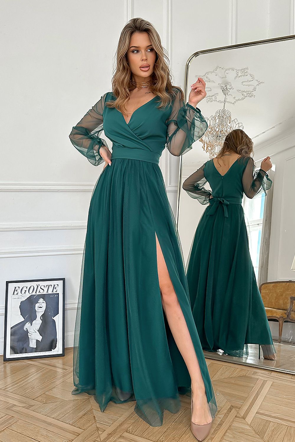 Elegant Bicotone long dress with a slit and belt, showcasing flowing fabric and sophisticated design, perfect for special occasions.
