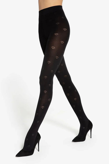 Close-up of Gatta tights with an exquisite heart design, highlighting the high-quality, soft fabric and flawless finish, ideal for stylish and sophisticated outfits.