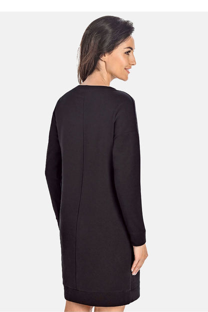 Interior details of Teyli Women's Elegant Black Cotton Knee-Length Dress, highlighting high-quality breathable fabric and luxurious finish with logo accent.