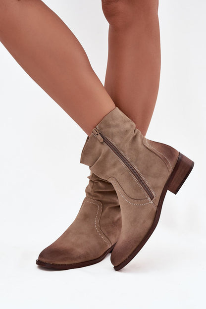 Chic women's eco suede ankle boots from Step in Style, showcasing a low 3.5 cm heel and 15.5 cm upper height, beautifully complementing both pants and dresses.
