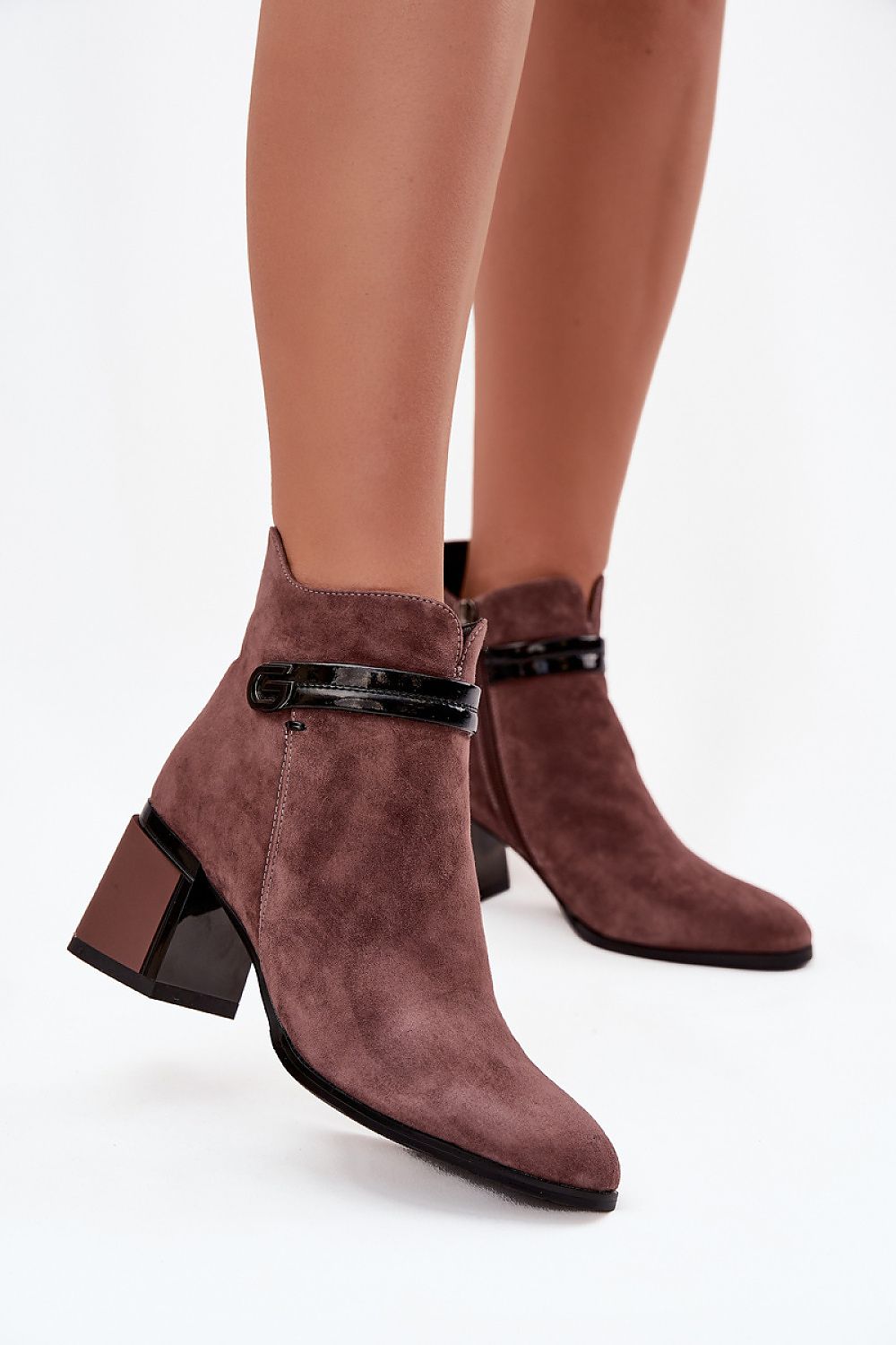 Elegant women's suede ankle boots by Step in Style, featuring a 7 cm heel, insulated interior, and zipper fastening, perfect for stylish comfort in cooler weather.