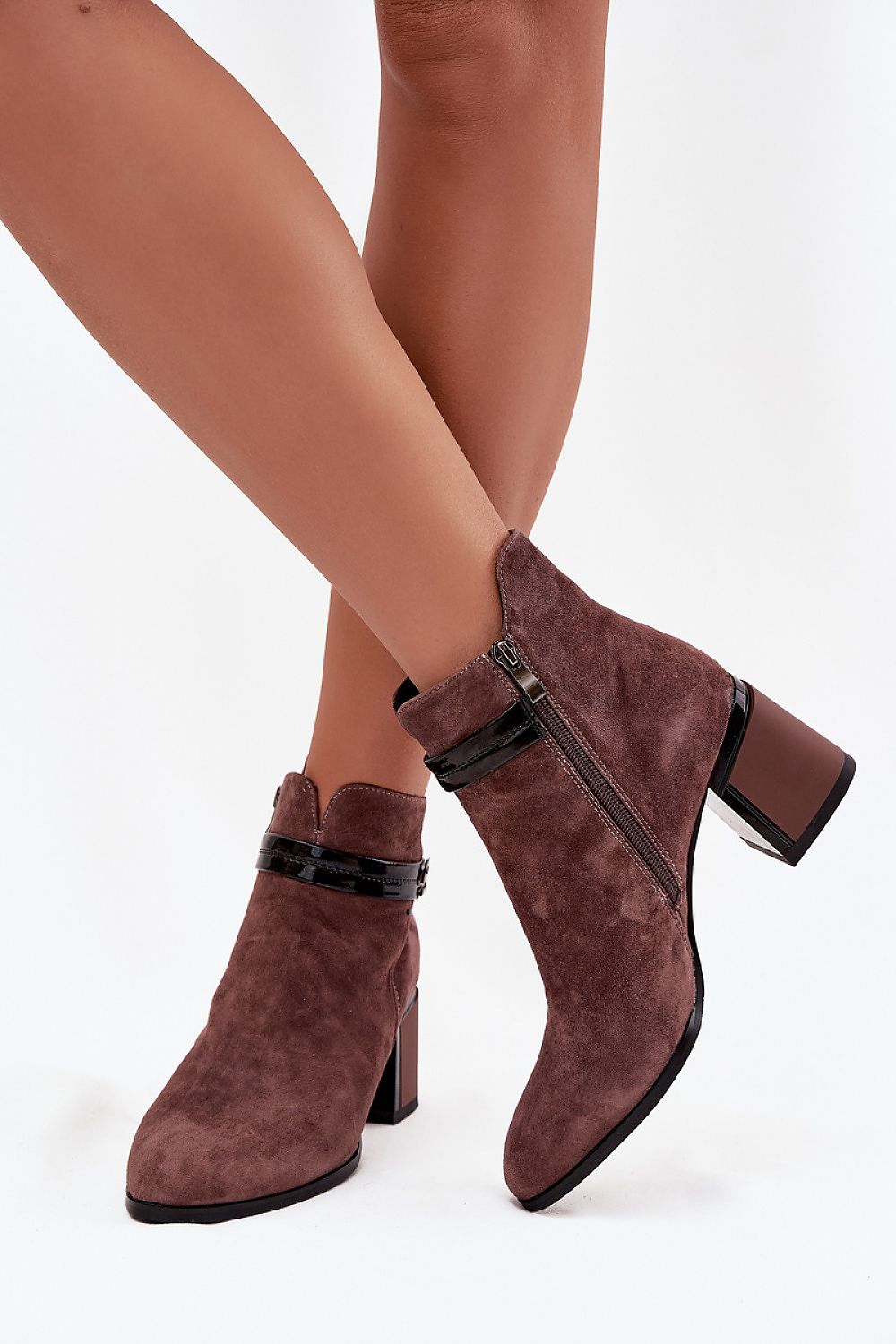 Luxury women's ankle boots in natural suede from Step in style, showcasing a decorative strap and a stable 7 cm heel for chic and comfortable wear.