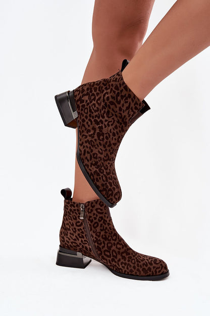 Elegant women's suede ankle boots with panther print from Step in Style, featuring a fashionable block heel design and zipper fastening, perfect for chic and sophisticated outfits.