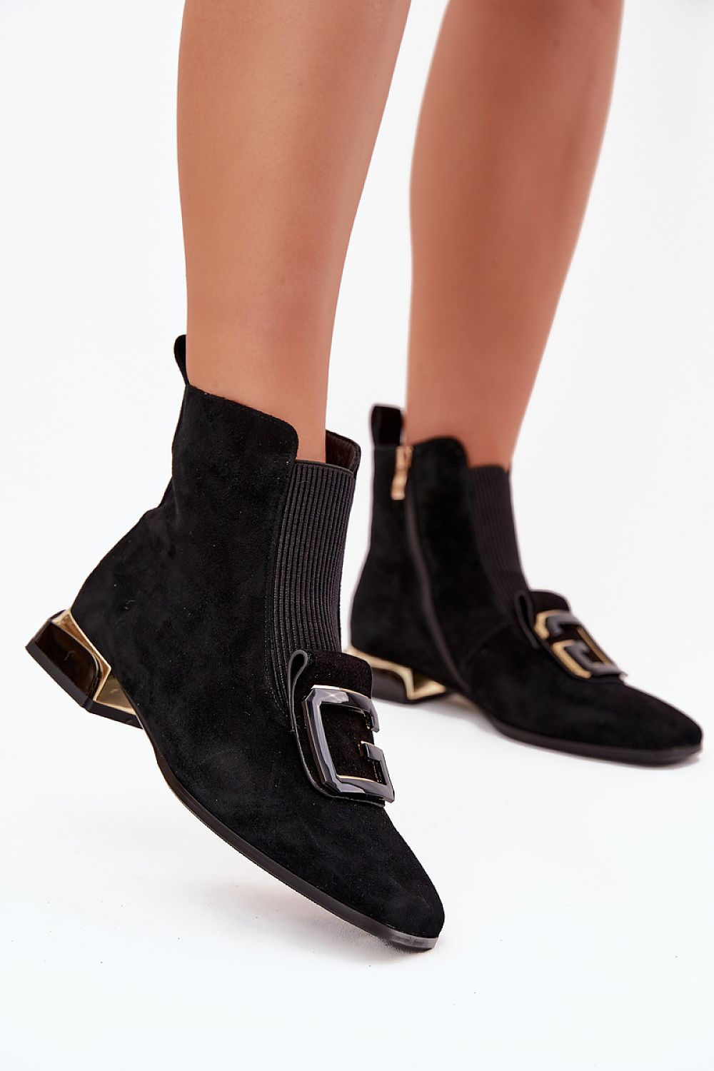 Elegant women's suede ankle boots by Step in Style with a low 3cm heel and side zipper, showcasing modern chic and comfort perfect for any outfit.