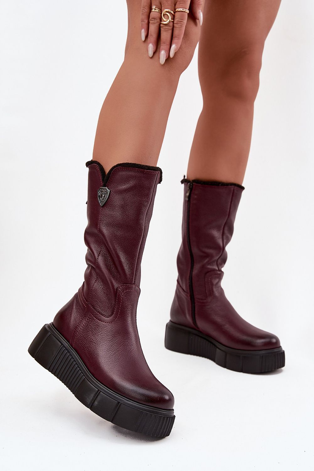 Luxury women's thigh-high leather boots with wool lining by Step in Style, featuring a wedge platform heel and decorative elements, perfect for winter elegance.