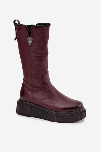 Step in Style luxury women's thigh-high leather boots, showcasing high-quality natural leather with a warm wool lining and a stylish zipper on the side.
