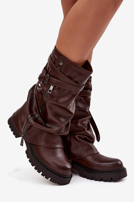 Elegant close-up of Step in Style's mid-calf boots with decorative details, highlighting the stylish pleated shaft and comfortable flat heel, perfect for autumn-winter wear.