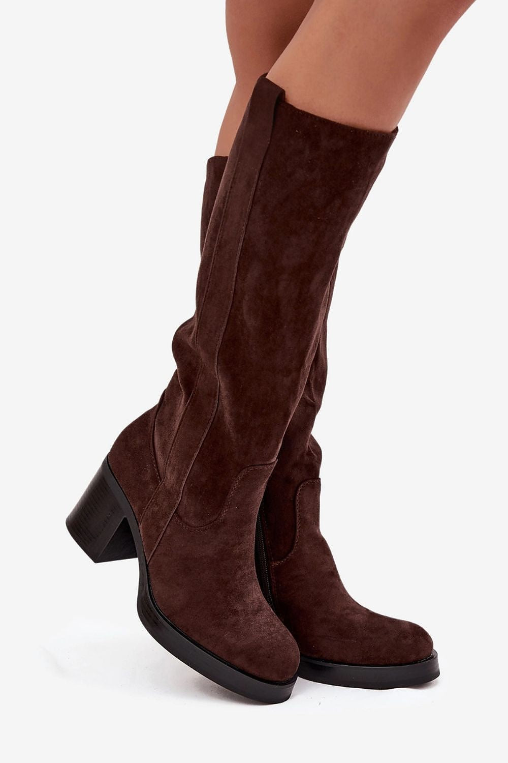 Stylish close-up of Step in Style eco-suede heel boots with rounded toes and practical zipper closure, perfect for any elegant outfit.