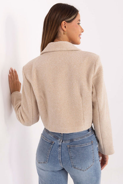 Elegant short women's coat by Rue Paris, featuring a classic double-breasted design, wide lapels, and long sleeves, perfect for autumn-winter styling in sizes S/M and L/XL.