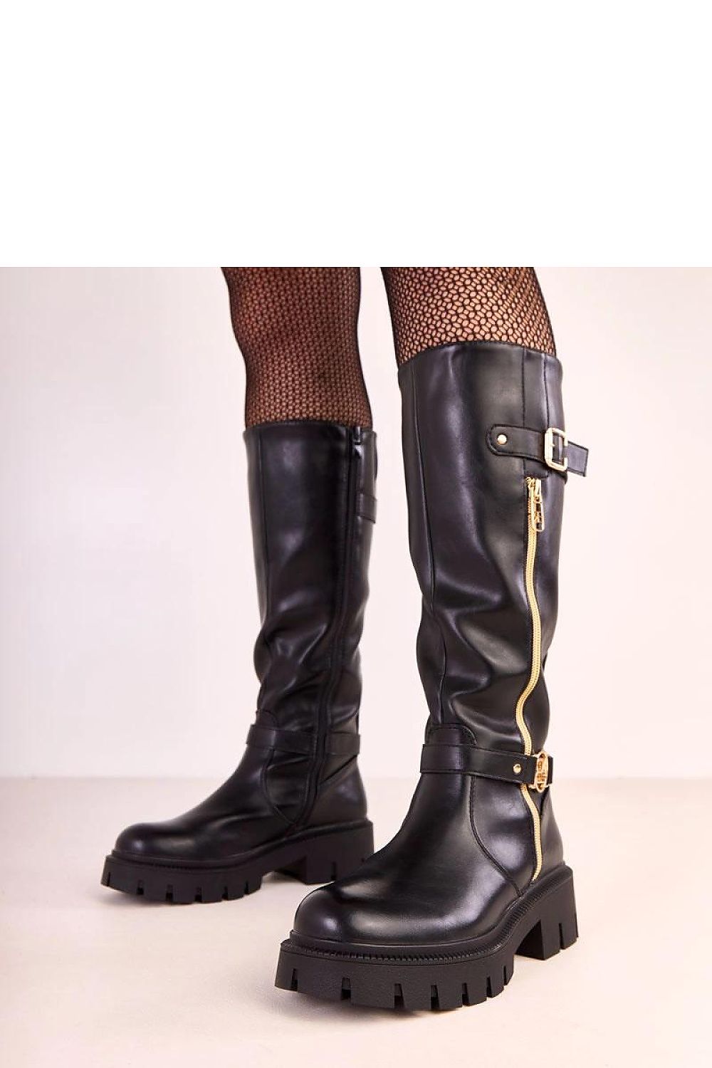 Elegant vegan leather thigh-high boots by Solea featuring a gold zipper detail and 5 cm heel, perfect for stylish autumn-winter fashion.
