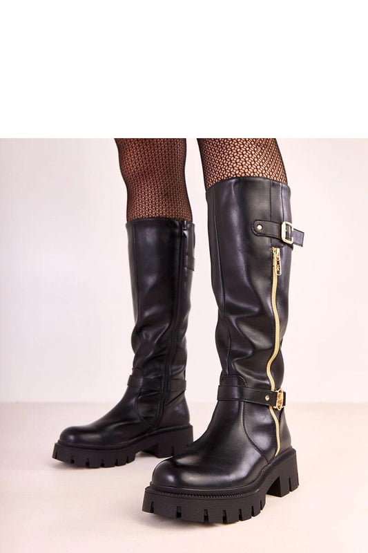 Elegant vegan leather thigh-high boots by Solea featuring a gold zipper detail and 5 cm heel, perfect for stylish autumn-winter fashion.
