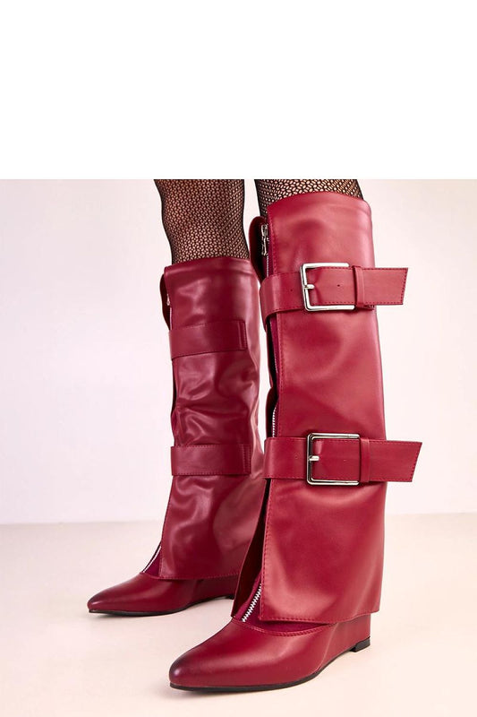 Elegant Solea knee-high buskin boots in faux leather featuring a 8 cm wedge heel, ideal for autumn-winter fashion.