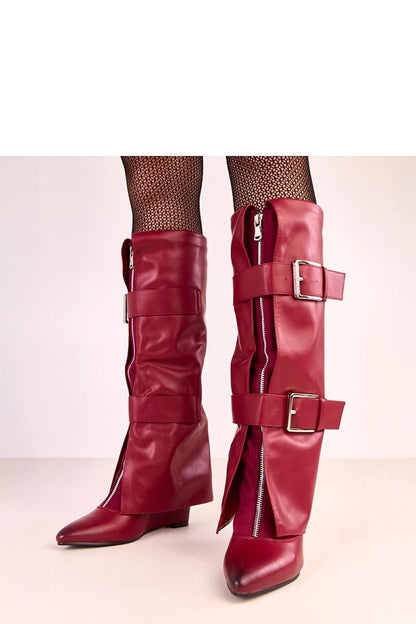 Stylish Solea buskin boots showcasing a turned-down shaft and decorative buckles, perfect for both casual and formal outfits.