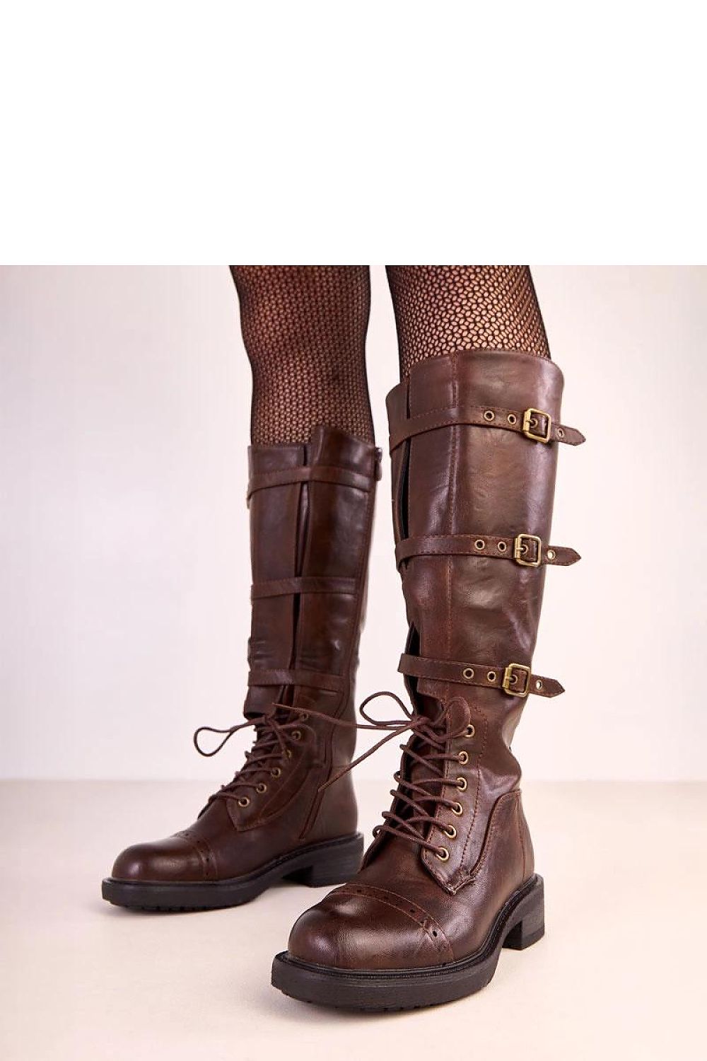 Luxurious vintage-inspired knee-high thigh-high boots by Solea, crafted from high-quality vegan leather, featuring decorative straps, a comfortable round toe, and a stable 4 cm heel, perfect for stylish winter looks.
