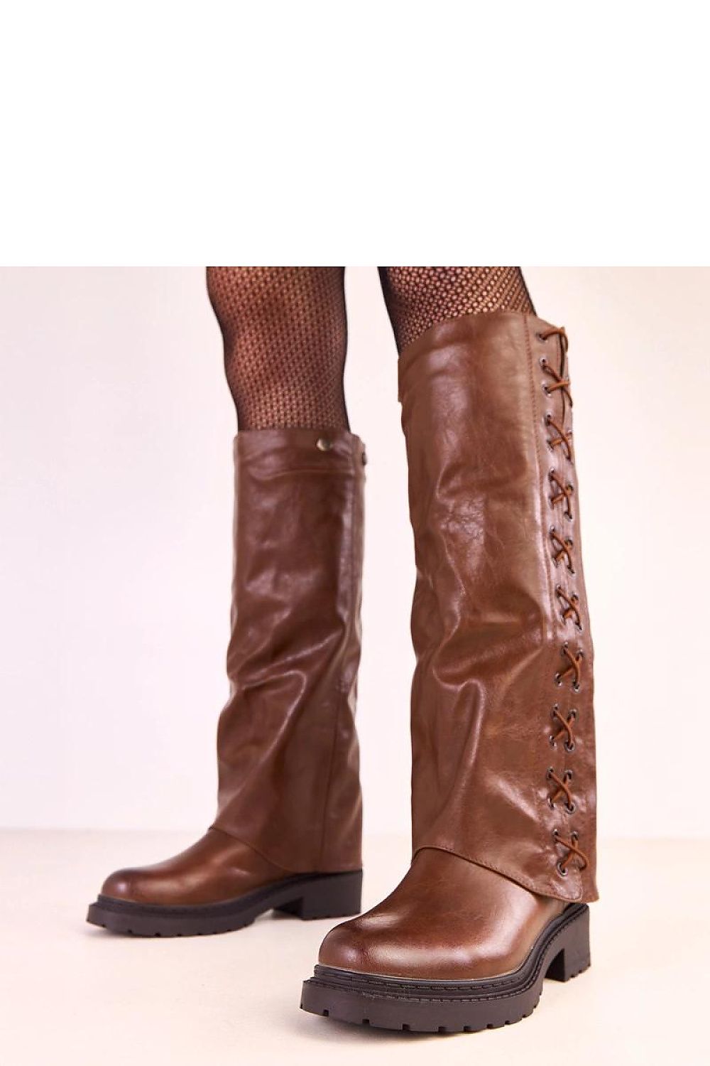 Solea thigh-high eco-leather boots featuring a unique detachable layer and stylish lacing, perfect for elegant winter fashion.