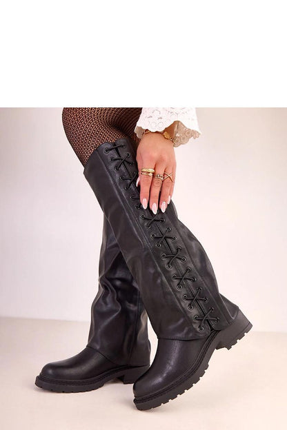 Sophisticated thigh-high boots by Solea, featuring a fashionable detachable layer and fashionable lacing, combining elegance and practicality for modern women.