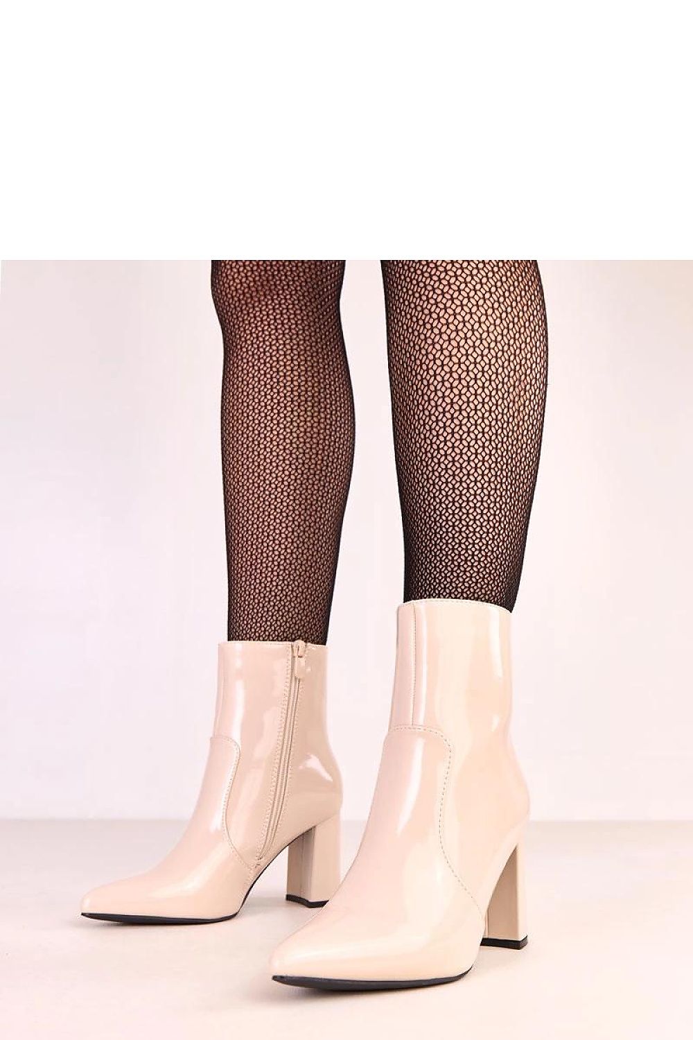 Solea elegant eco-leather ankle boots featuring an 8cm heel and pointed toe, perfect for a stylish and luxurious look.