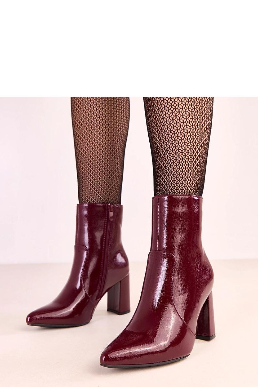 Elegant Solea ankle boots in eco-leather featuring a stylish pointed toe and 8cm heel, perfect for sophisticated outfits.