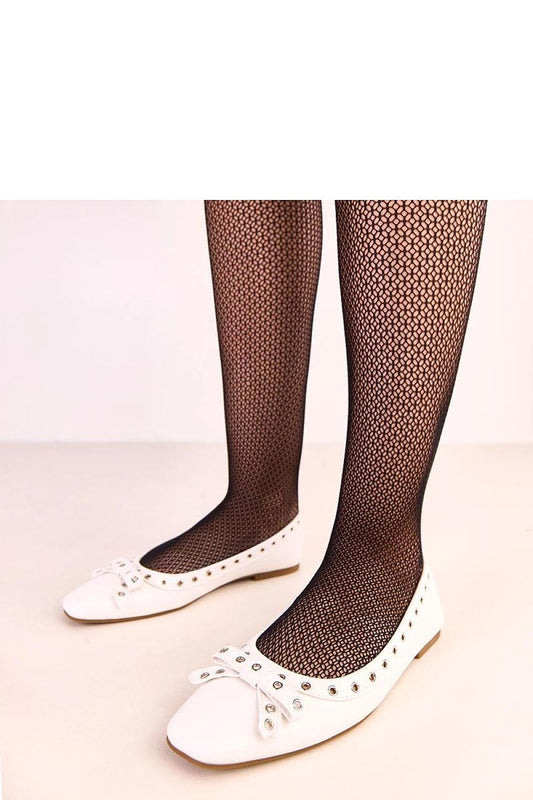 Close-up of Solea's luxurious faux leather ballet flats featuring a unique square toe and charming decorative bow, ideal for comfortable everyday wear.