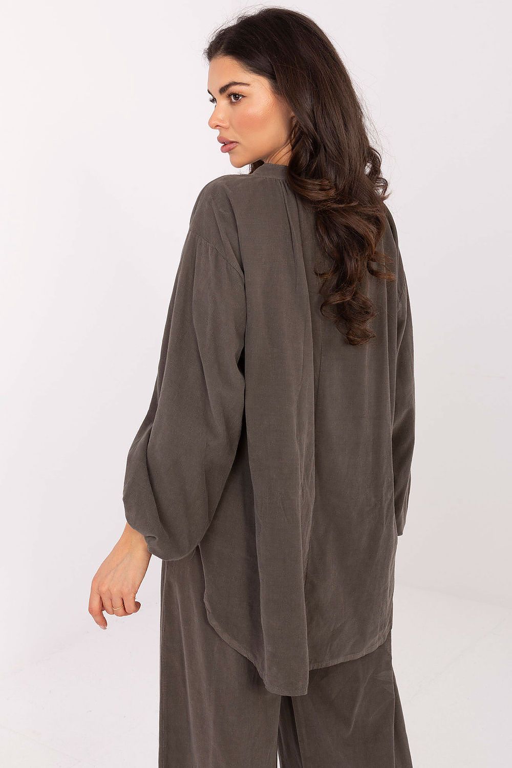 Versatile Italy Moda Casual Blouse designed in solid colour, ideal for pairing with jeans or skirts for a fashionable daily look.