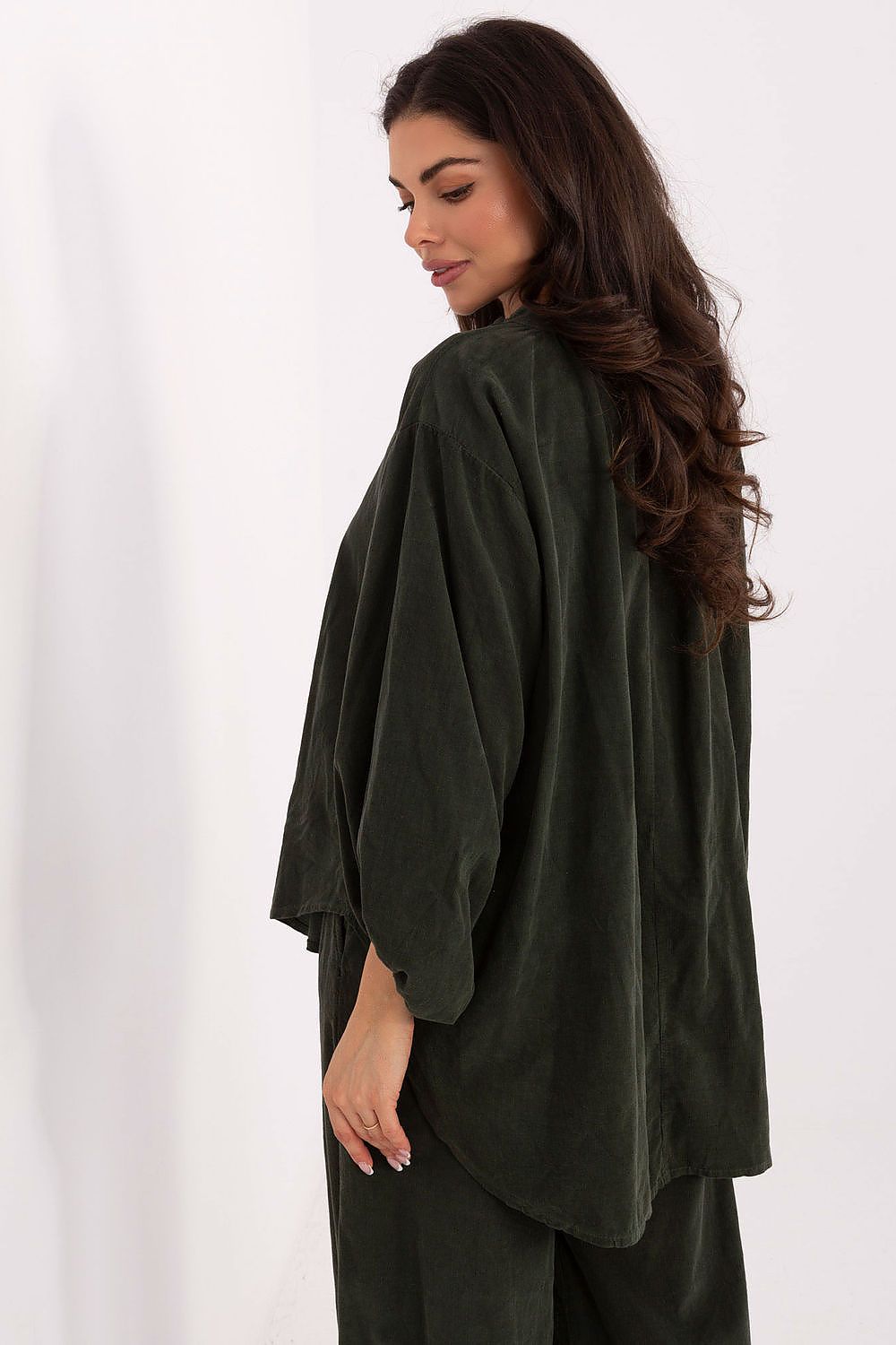 Italy Moda's chic polyester blouse showcasing a delicate heart-shaped neckline and long sleeves, offering a touch of luxury for everyday elegance.