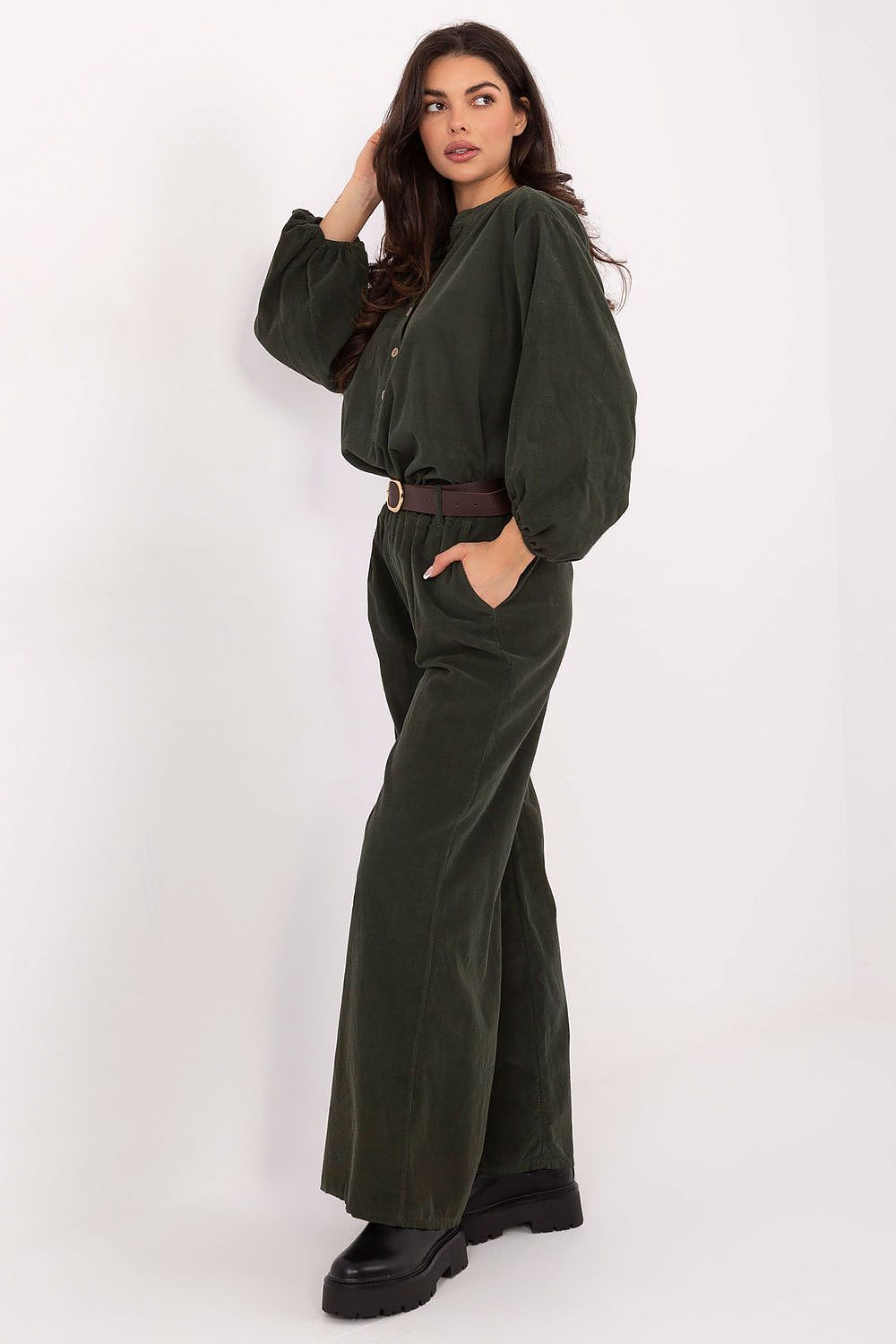 Elegant side view of Italy Moda's women's wide leg corduroy trousers, showcasing their soft texture and stylish high waist for fashionable everyday wear.
