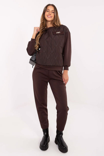 Elegant Italy Moda Women's set in EU 0, showcasing a quilted blouse and high-waisted trousers made from a luxurious viscose blend.