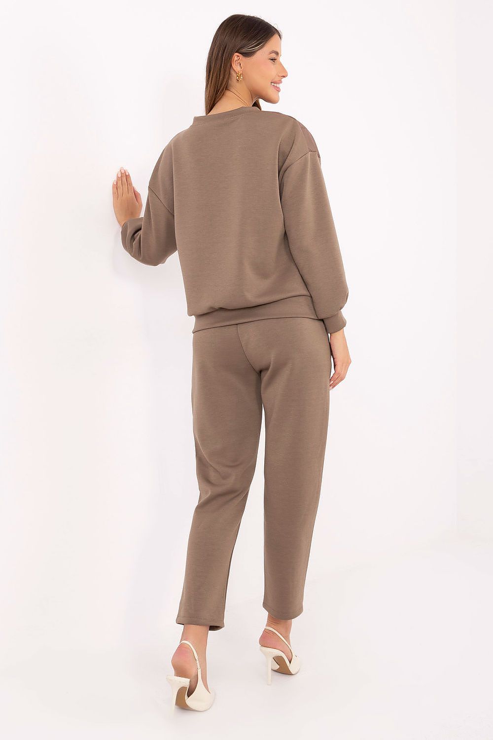 Luxury Women's Casual Set by Italy Moda featuring an elegant blouse with a quilted front and high-waisted tapered pants, made from a soft viscose blend.