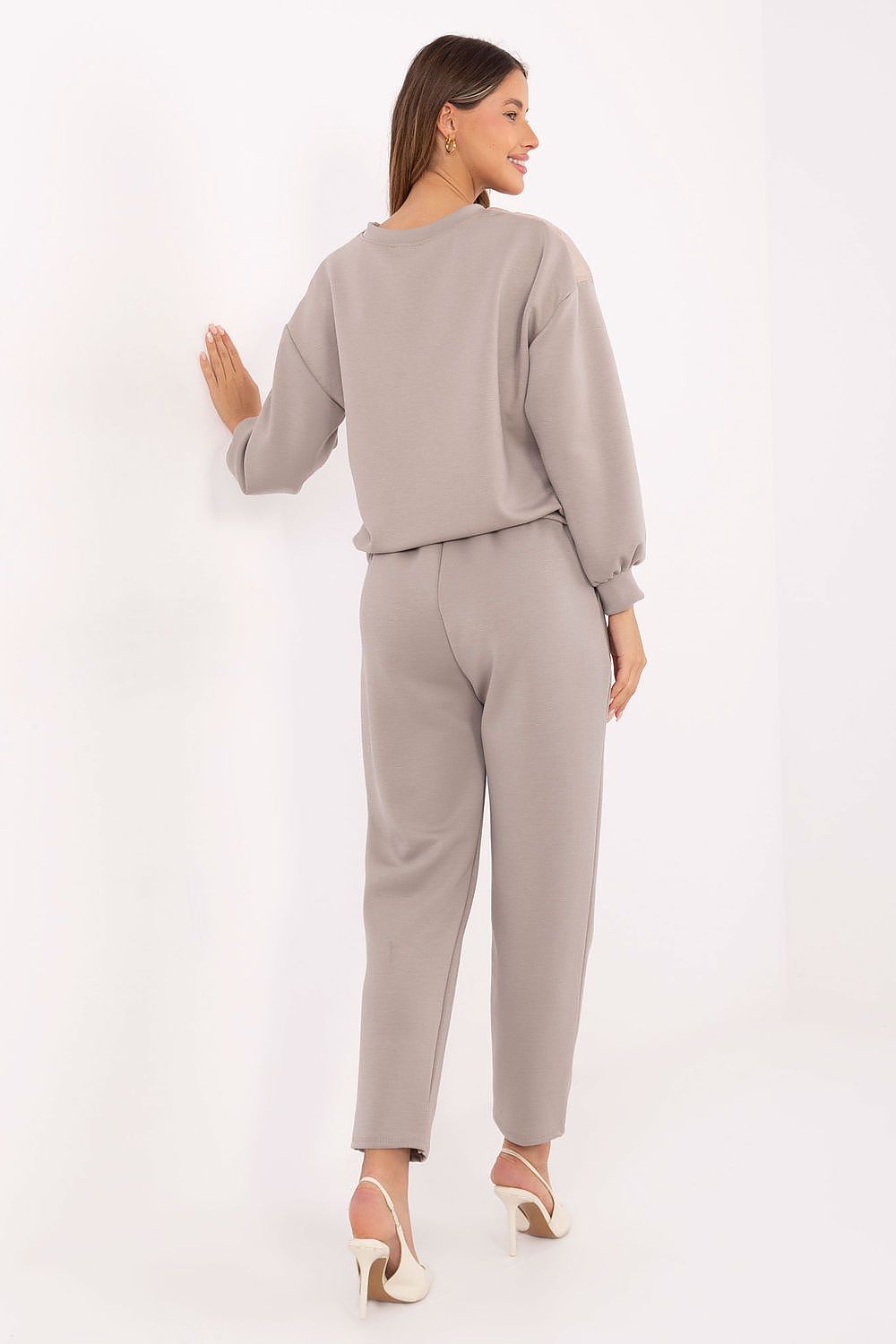 Italy Moda high-waisted tapered pants designed for women, featuring side slip pockets and a comfortable tie waist for a flattering fit.