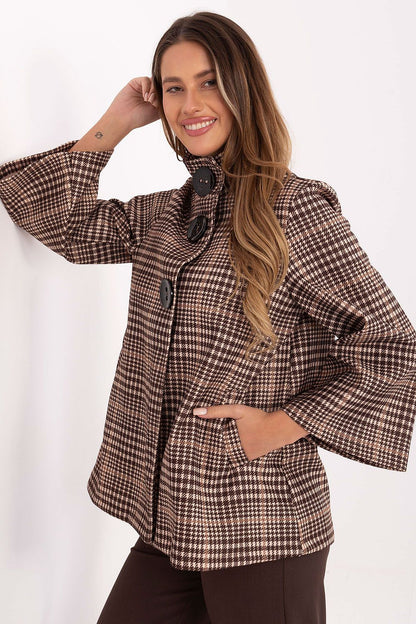Elegant checkered women's coat by Italy Moda, featuring a stylish design and made from high-quality polyester blend, perfect for winter outfits.