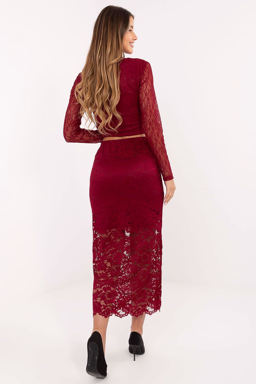 Chic and stylish Italy Moda lace midi skirt on a model, demonstrating its flattering fit and unique decorative gathering for a sophisticated look.