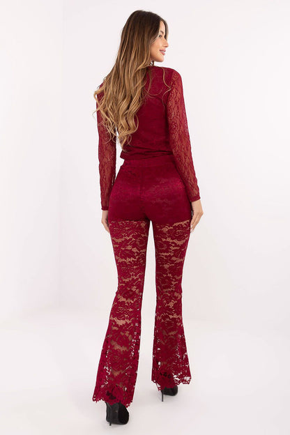 Full view of women wearing Italy Moda's Luxury Lace Bell-Bottom Pants, highlighting stylish high waist and flowing bell-bottom legs in a fashionable outfit.