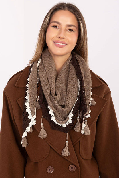 Model wearing an elegant AT triangular neckerchief, demonstrating its versatility for both casual and formal wear, accentuated by pearl fringes.
