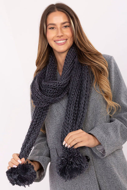 High-quality soft acrylic scarf with adorable pompons from AT, designed for warmth and fashionable winter styling.