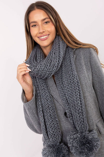 Versatile luxury scarf from AT, crafted from soft acrylic, 186 cm long with stylish pom poms, essential for a fashionable winter wardrobe.