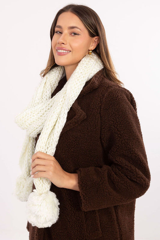 Elegant winter scarf from AT, made of high-quality acrylic with pompons, ideal for warmth and fashion during cold days.