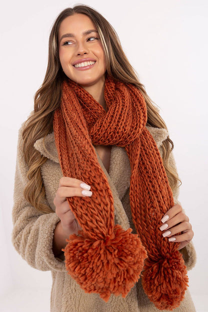 Luxurious 186 cm long acrylic scarf by AT featuring stylish pompons, perfect for creating a warm and chic winter look.