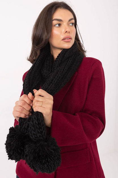 Cozy 100% acrylic scarf by AT, designed with fashionable pompoms, ideal accessory for cold weather sophistication.