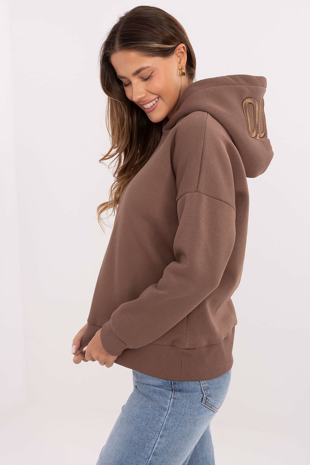 Close-up view of Relevance Women's Casual Hoodie showcasing the soft cotton blend fabric and chic printed inscription for a fashionable sporty style.