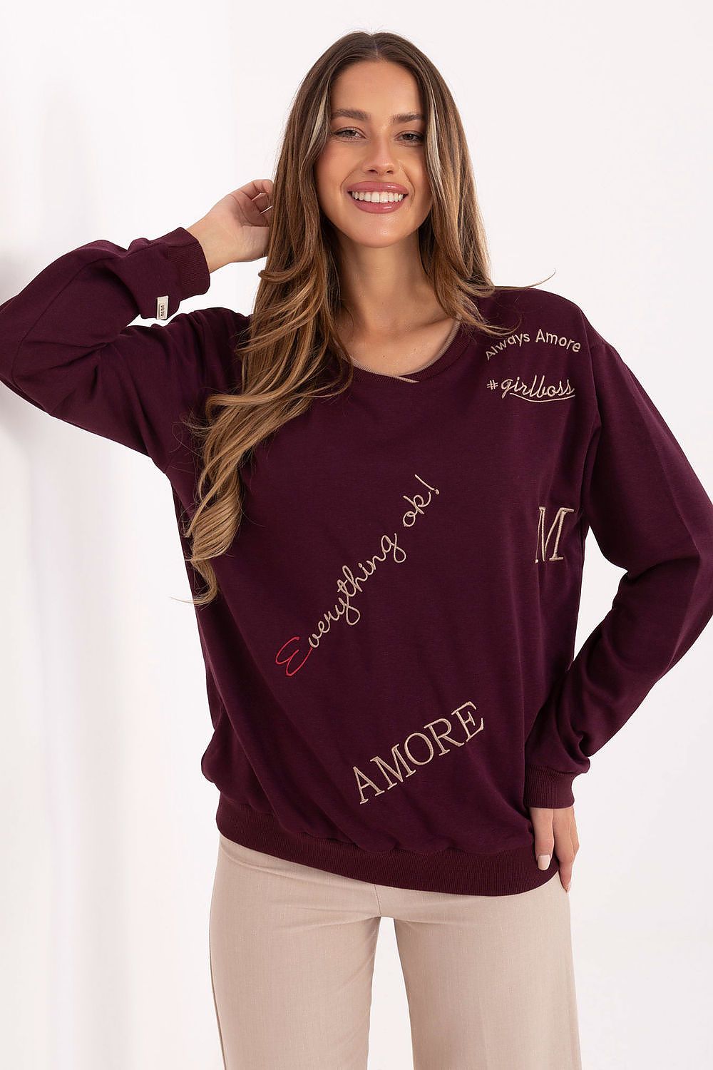 Elegant women's casual sweatshirt by Relevance featuring a soft cotton-polyester blend, ideal for luxurious everyday wear, showcasing a round neckline and long sleeves.