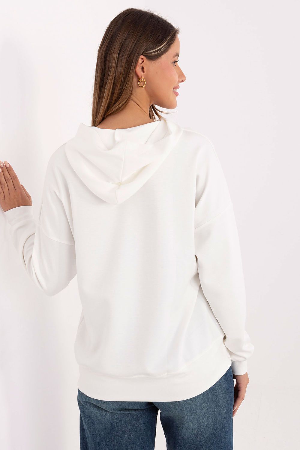 Chic women's sweatshirt from Relevance, showcasing a modern design with a hood, long sleeves, and unique patches, ideal for contemporary casual outfits.