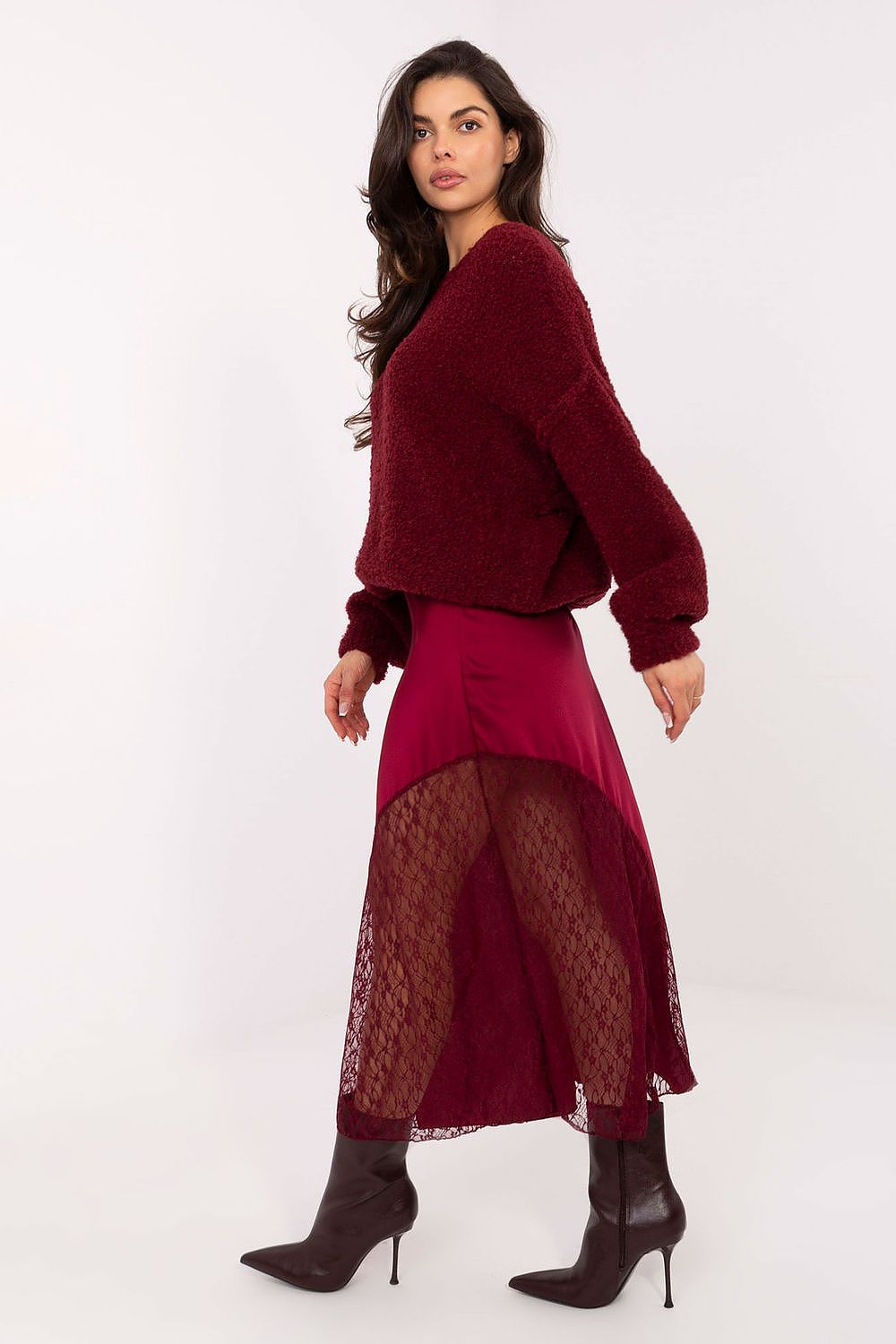Elegant Mermaid-Cut Midi Skirt in textured fabric with delicate lace insert, modelled by Rue Paris, perfect for both casual and formal occasions.