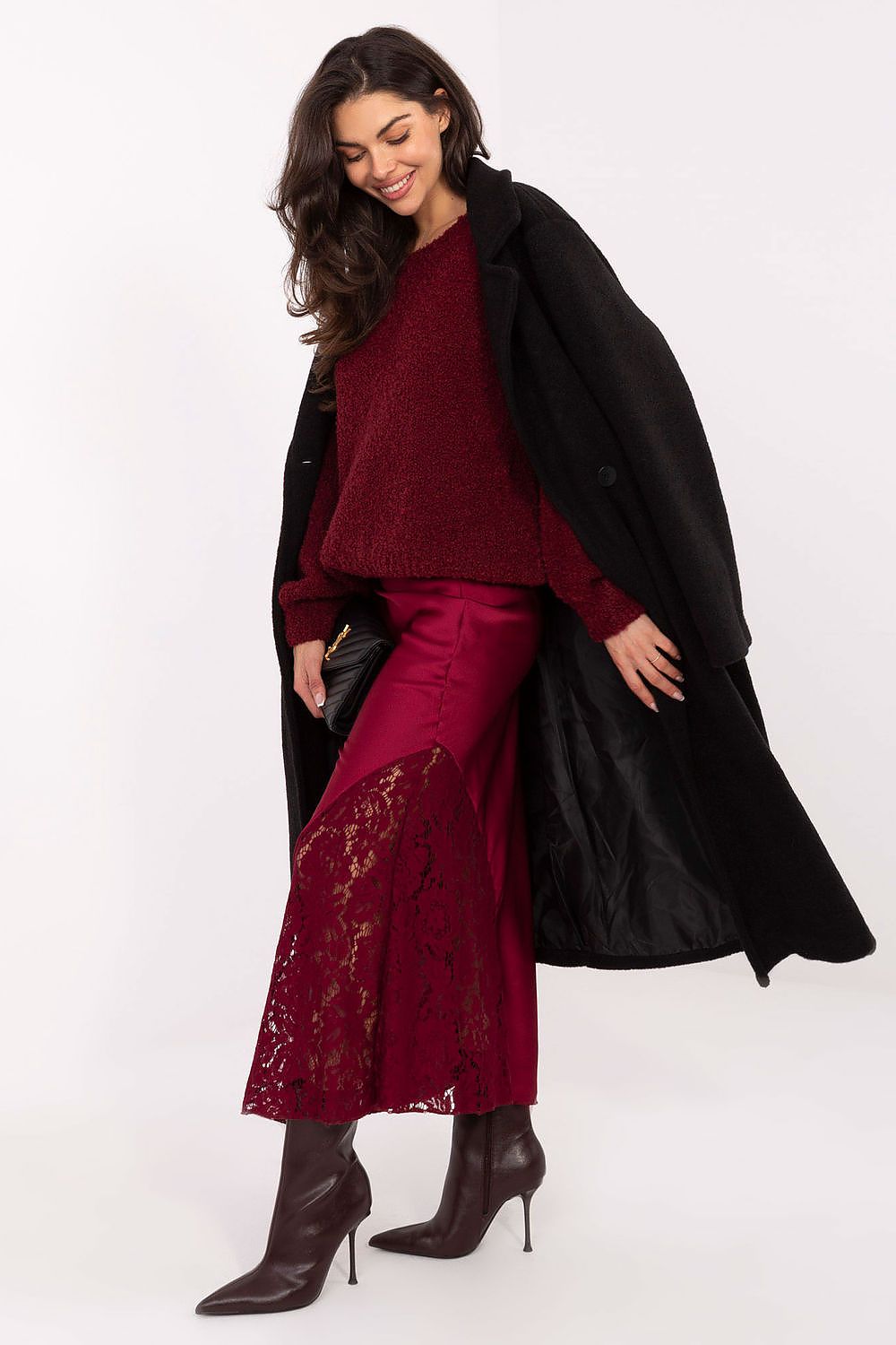 Close-up of Rue Paris Elegant Mermaid Midi Skirt showcasing exquisite fabric texture and feminine silhouette.