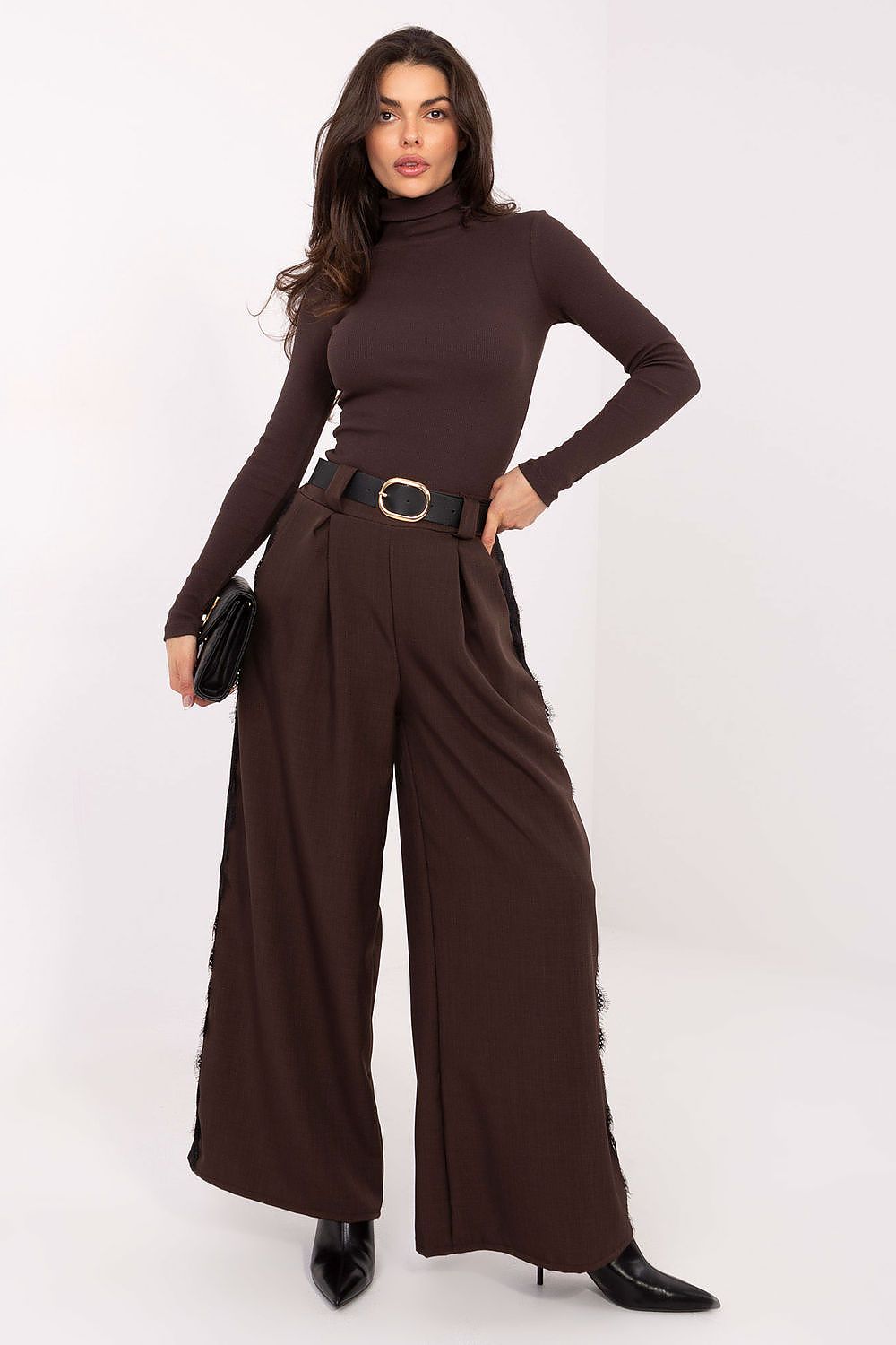 Close-up of Rue Paris turtleneck sweater fabric highlighting the soft texture and stylish ribbed detail suitable for luxury casual wear.